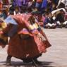 Dance of the Wrathful deities (gTum rngam). Dancer destroying the linga, dance arena, Paro Tshechu (tshes bcu), 3rd day