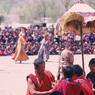 Dance of the Eight manifestations of Guru Rinpoche (Guru mtshan brgyad): Guru Rinpoche assisted by monks, Paro Tshechu (tshe bcu), 5th day