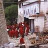 Monks file into the Great Assembly Hall