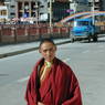 Local monk on the street in downtown Dartsedo [mda' rtse mdo].