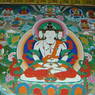 A mural of four-headed Vairocana in the Assembly Hall at Derge Monastery.