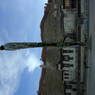 Prayer flag pole in the courtyard of Gyantse Monastery ??? of the Gyantse Kumbum Stupa.