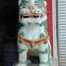 Statue of snow lion at the door to the monastery.