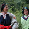 Tibetan women with turquoise hair ornaments.