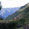 Tibetan house on hillside.