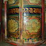 Large painted prayer wheel.