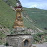 A stupa along the road.