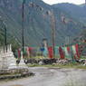 Prayer flags at the large white stone stupa at Dudo.