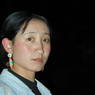 A Tibetan woman from Gyarong in a restaurant in Barkham.