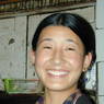 A Tibetan woman in a restaurant in Barkham.