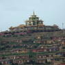 The Gyutrul Temple [sgyu 'phrul lha khang] seated on the ridge overlooking the Larung Gar [bla rung gar] religious settlement.