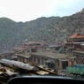 View of the central area of Larung Gar with the Nunnery Hill in back and Gyutrul Temple in the right upper corner.
