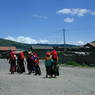 Khampa girls walking down the street.