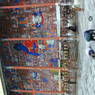 Pilgrims prostrating to the carved images.