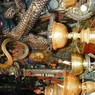 Offerings of butter lamps in front of Jowo Rinpoche, a statue of the Buddha believed to date from the seventh century and the most sacred image in Tibet.