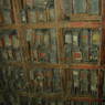 Shelves full of traditional Tibetan texts.