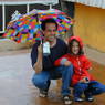 David Germano and a young Tibetan-American girl on the rooftop of the palace.