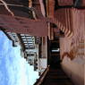 A view along the side of the palace from an outside patio near the rooftop.