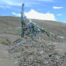 The cairn and prayer flag pole erected at the pass.