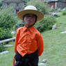 A young nomad boy on the path to the courtyard.