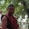 A monk debating religious topics in the debate courtyard.