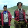 A group of nomad men across the road from the county stupa.