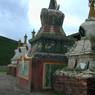 A close up of some of the smaller stupas that surround the county stupa. ??