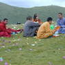 Chinese monks eating lunch on top of the hill.