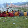 Chinese monks eating lunch on top of the hill.