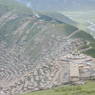 A view of Larung Gar, with the Gyutrul Temple in the foreground, from the top of Jomo Hill.