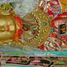 Close up of the statue of Shakyamuni Buddha.
