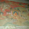 A scene depicting Shakyamuni Buddha and disciples on the walls of the inner circumambulation corridor.