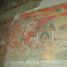 A scene depicting Shakyamuni Buddha and disciples on the walls of the inner circumambulation corridor.