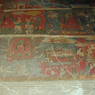 A scene depicting the Buddha in various postures on the walls of the inner circumambulation corridor.