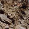 The site’s north ledge. Note the massive revetment lining the rim of the ledge.