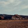 The formation with the modern Kardung (<i>dkar dung</i>) Village in the foreground. Note the modern Buddhist structures on the summit.