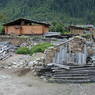 A house built near an area where houses were destroyed by fire in the village of sPyi pa, in Kong po