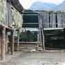 Grain processing stalls in the village of bdud ma, in Kong po