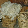 Wool in baskets inside a house in the village of Lo, in Kong po