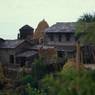 House3 with four bay maize rack straw stacks in the foreground