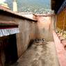 Courtyard outside bKa 'gyur temple, Phur lcog hermitage