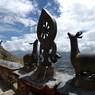 Deer and Dharma Wheel, roof of main building, Sera Dbu rtse