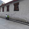 Two boys near temple in Dartsedo (Kangding)