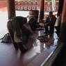 Tibetan workmen constructing a statue at Lhagang Monastery