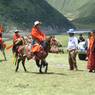 Young man racing his horse at the Lhagang Horse Festival.&nbsp;