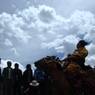 Tibetan man riding horse during Lhagang Horse Festival.&nbsp;