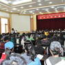 A view of the conference room and all the participants