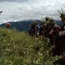 Bropon (lead master) making offering to the dieties as program starts