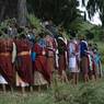 After reaching near the tree they circumumbulates the tree chanting Bro