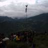 People gathers near flag to watch Bro